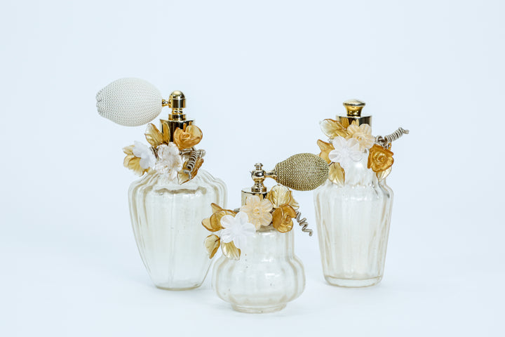Perfume Bottle with Gold flowers and petals